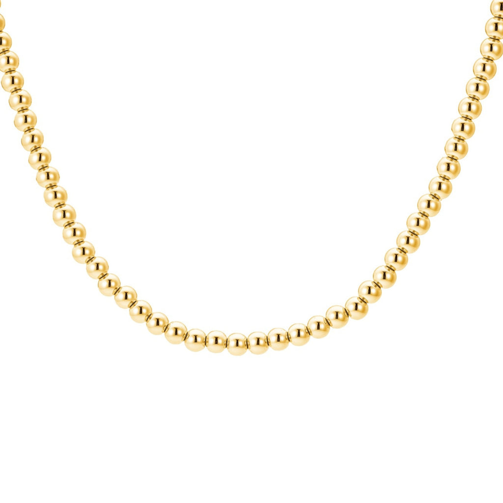 Gold beaded necklace on a white background