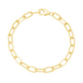 Gold chain bracelet on a white background
