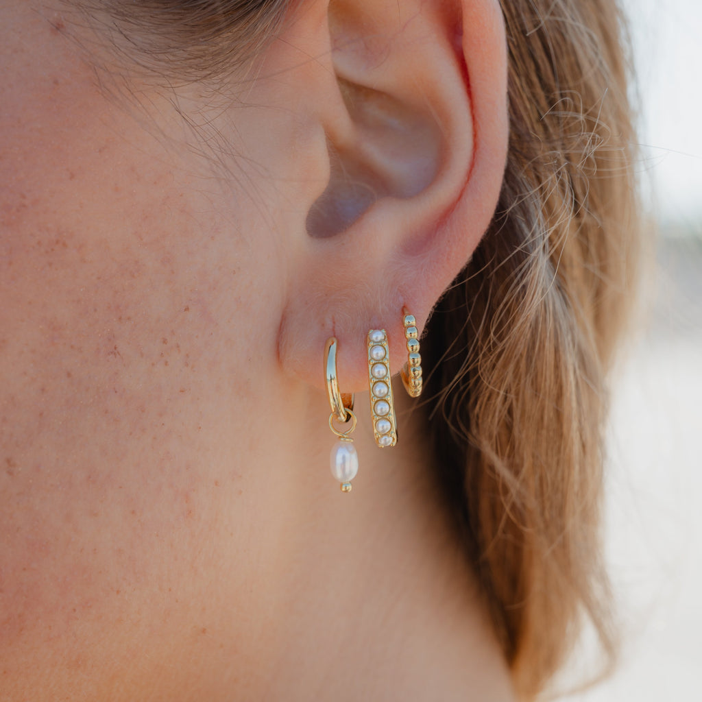 Earrings worn on model for elegant everyday look