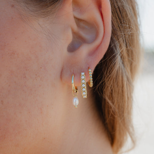 Earrings worn on model for elegant everyday look