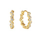Gold hoop earrings featuring bezel-inspired irregular shape

