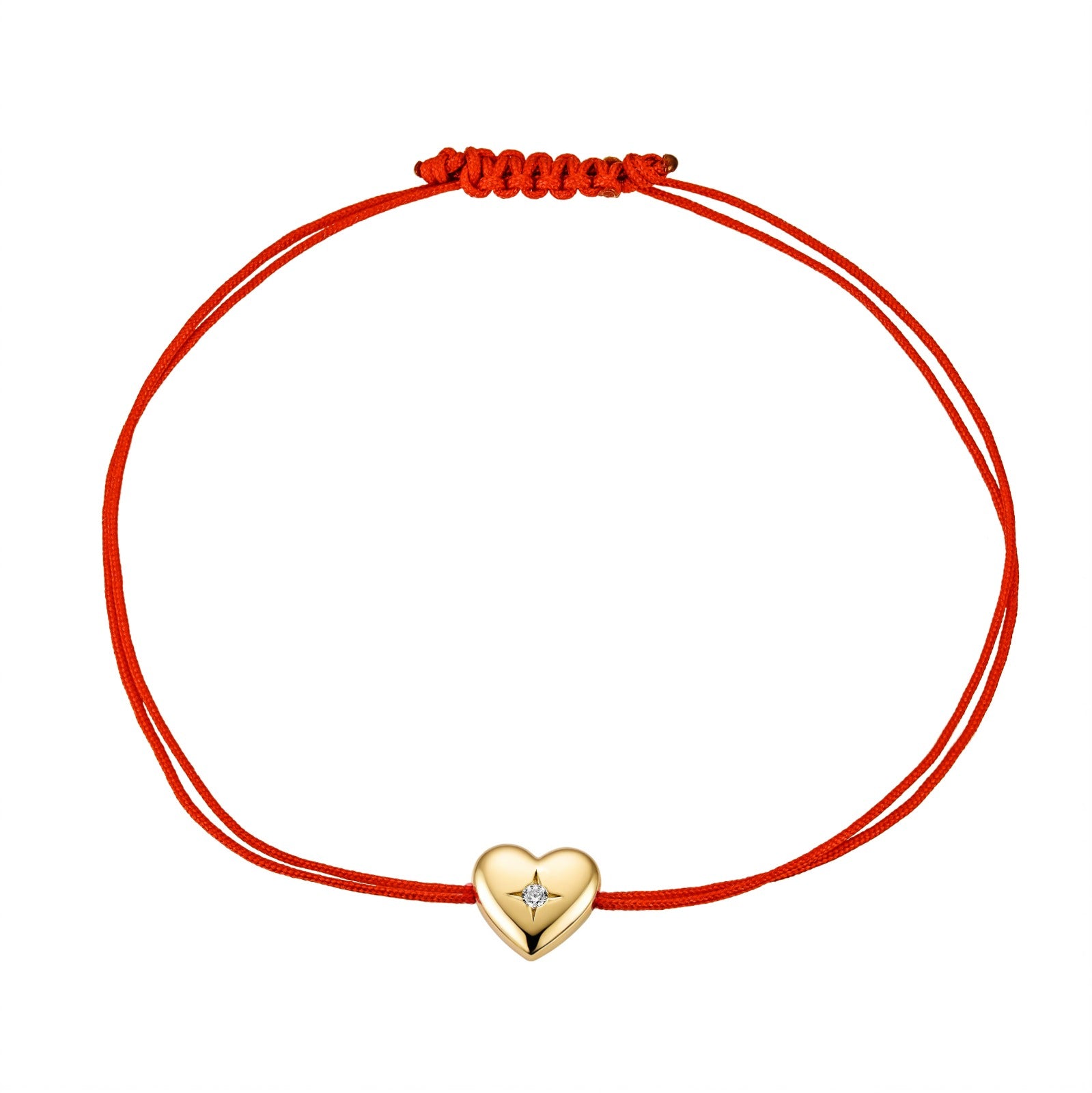 Gold heart charm on red string bracelet, delicate and stylish