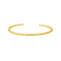 Gold bracelet on a white background