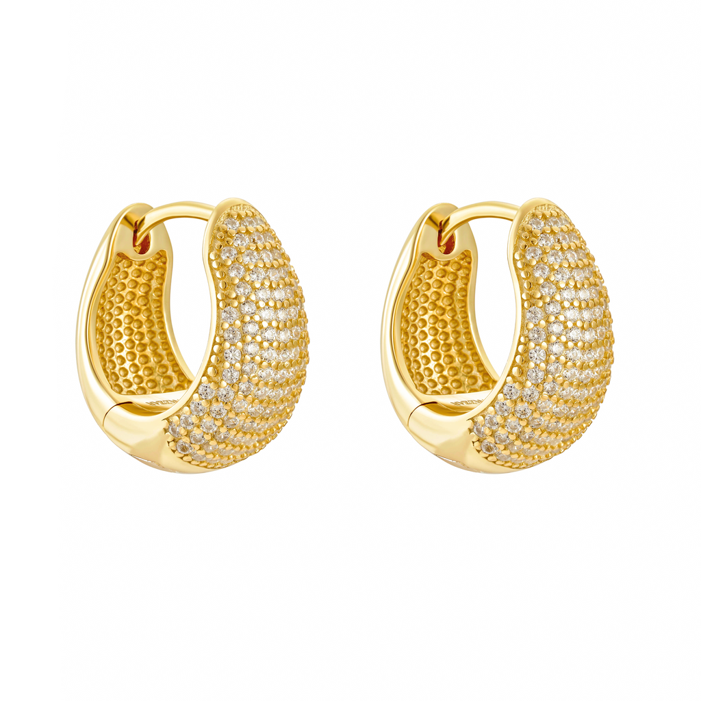 Puffy gold hoop earrings encrusted with pavé detailing for a statement look